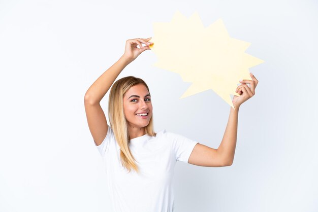 Blond Uruguayaans meisje geïsoleerd op een witte achtergrond met een lege tekstballon