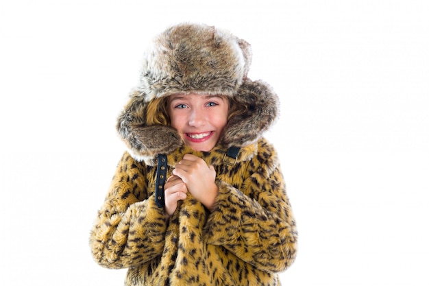 Blond winter kid girl cold freeze gesture and fur