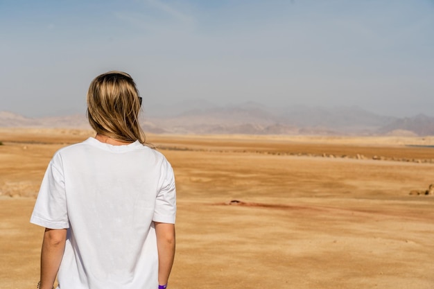 Blond woman at desert of Ras Mohammed national park Sinai Egypt