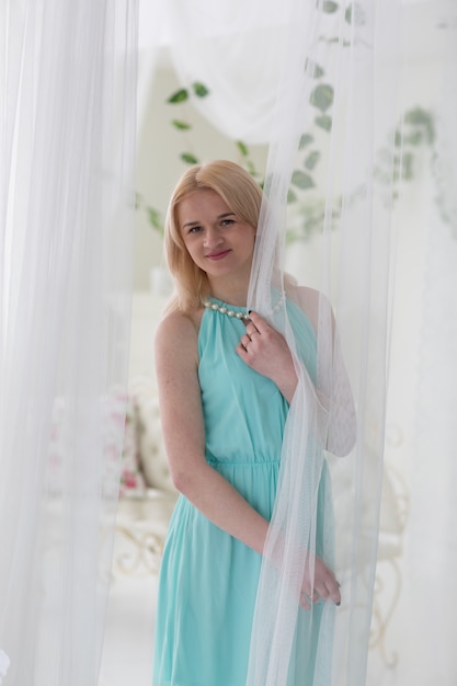 Blond woman in greek dress