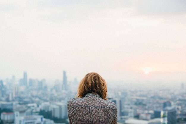 Blond woman at a rooftop