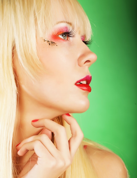 Blond woman with bright make-up