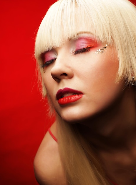 Blond woman with bright makeup