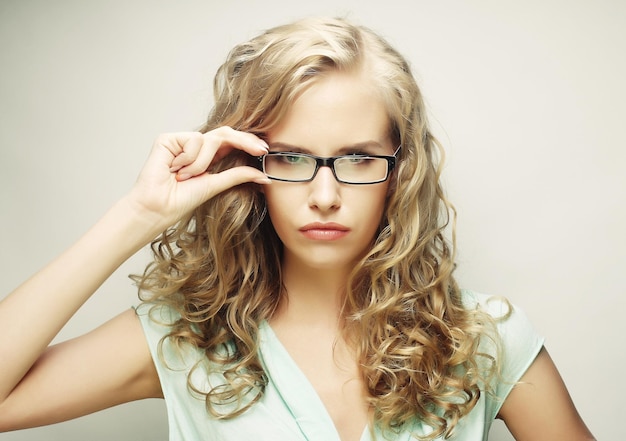 Blond woman with glasses