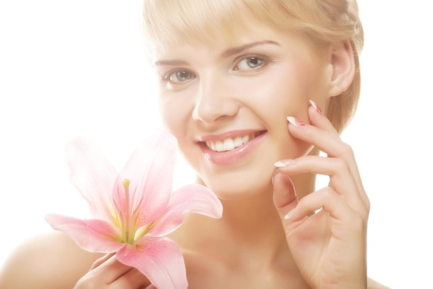 Blond woman with pink lily