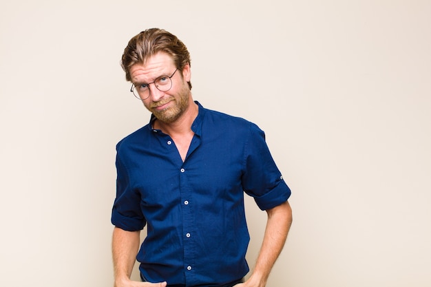 Blonde adult caucasian man in shirt isolated