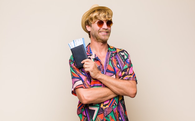 Blonde adult man wearing glasses isolated