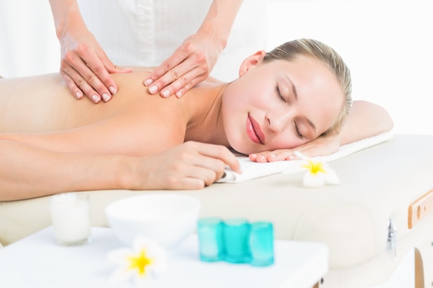 Blonde enjoying a back massage 