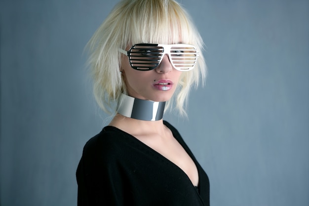 blonde fashion futuristic silver glasses girl  gray background