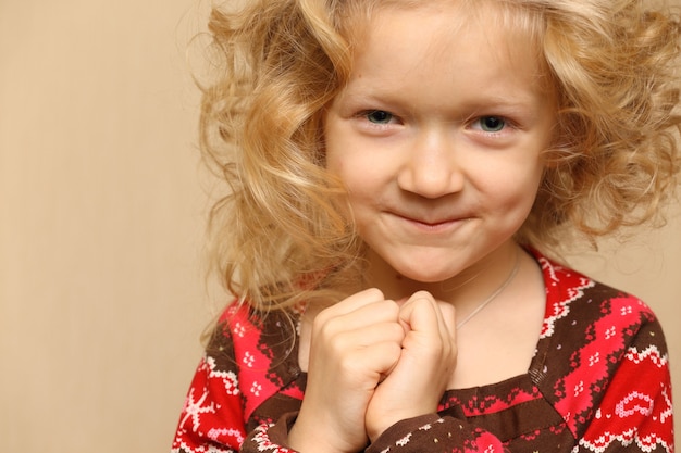 Blonde girl portrait, close-up