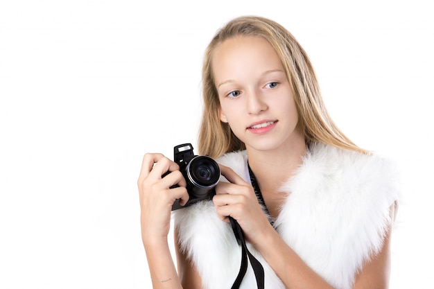 Photo blonde girl posing with her camera