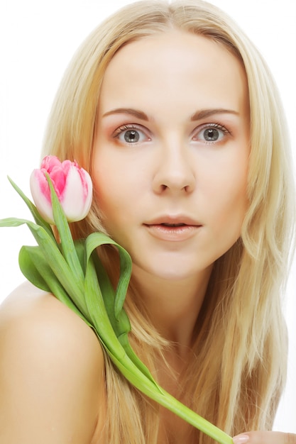 Blonde girl with tulip