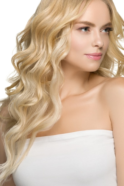 Blonde Hair Woman Beautiful Curly Hairstyle Wavy Long hair. Isolated on white. Studio shot.