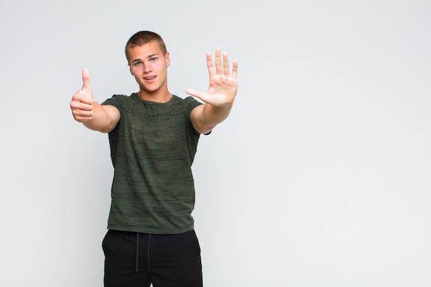 Blonde man smiling and looking friendly