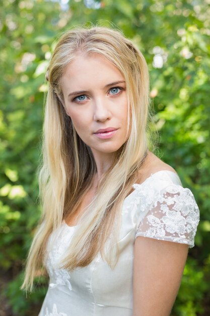 Blonde pretty bride looking at camera