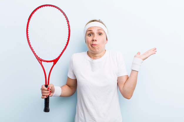 Blonde pretty woman practicing tennis sport