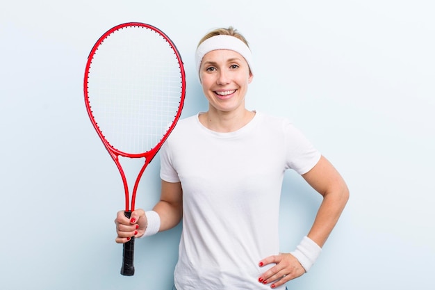 Blonde pretty woman practicing tennis sport