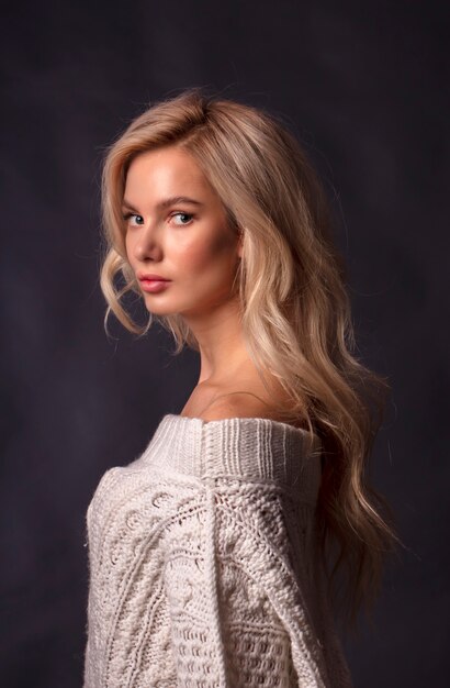 Blonde studio portrait of a young girl