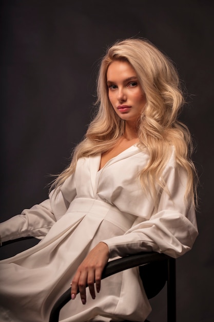 Blonde studio portrait of a young girl