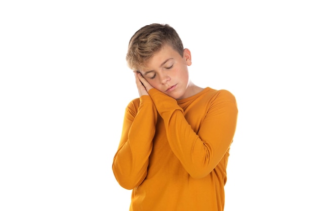 Blonde teenager boy with yellow tshirt