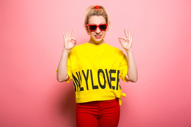 Blonde woman in bright clothes