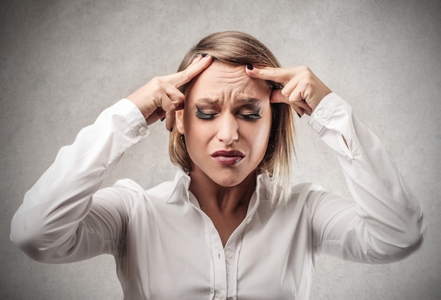 Blonde woman having pain