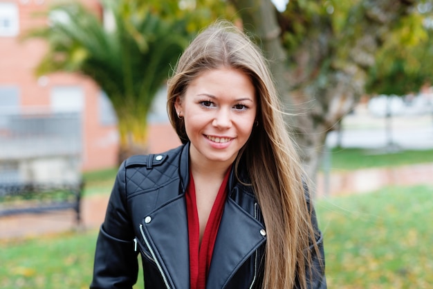 Blonde woman in a park