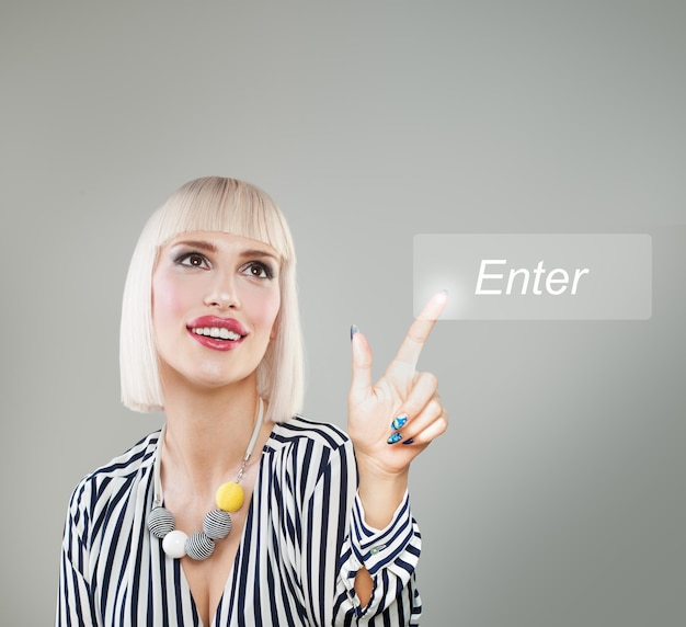 Blonde woman pushing enter icon Choice and agree concept