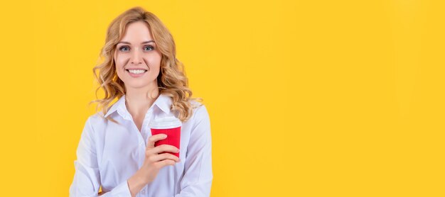 Blonde woman smile with coffee cup on yellow background woman isolated face portrait banner with mock up copy space