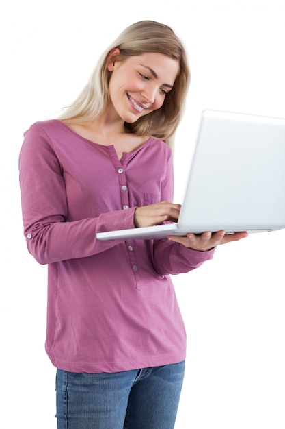 Blonde woman using a laptop