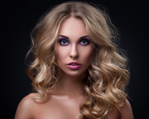 Blonde woman with curly hair