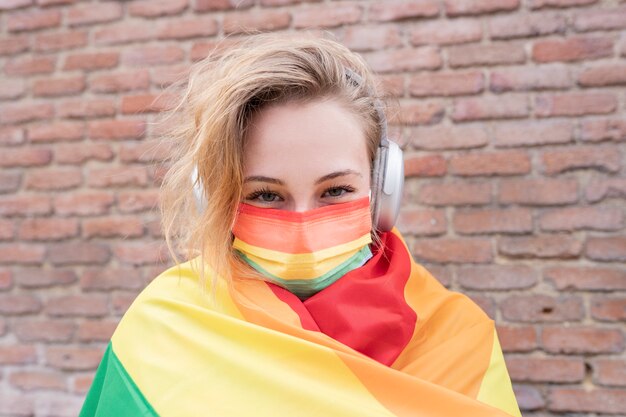 Blonde woman with gay pride flag