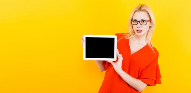 Blonde woman with tablet pc