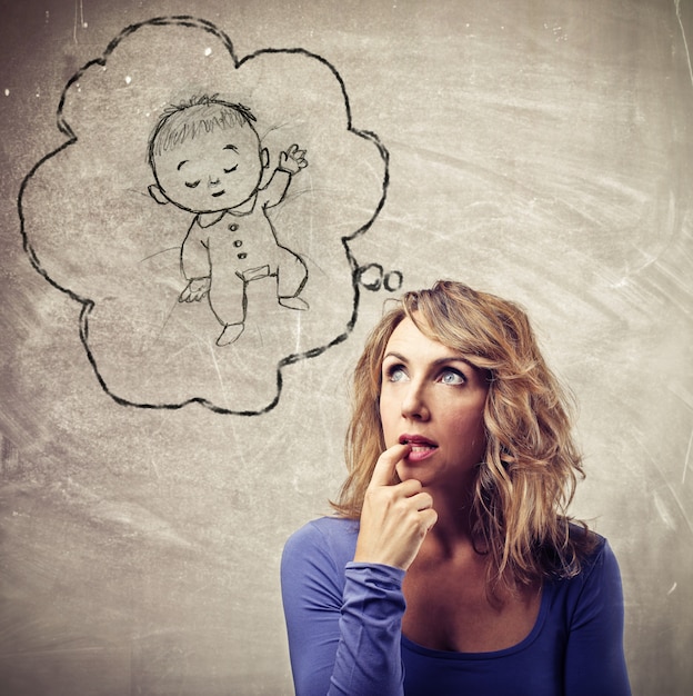 Blonde woman wondering about a baby