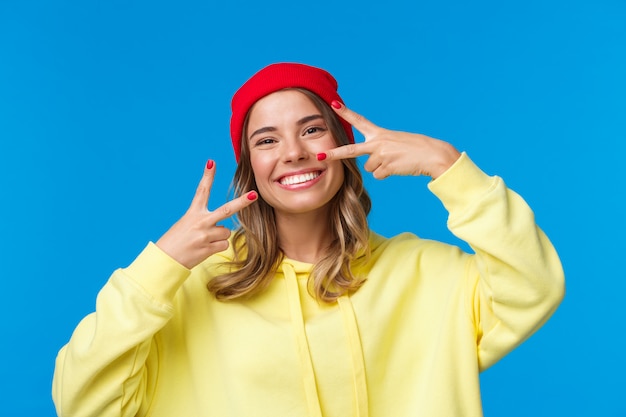 Blonde woman in a yellow sweatshirt