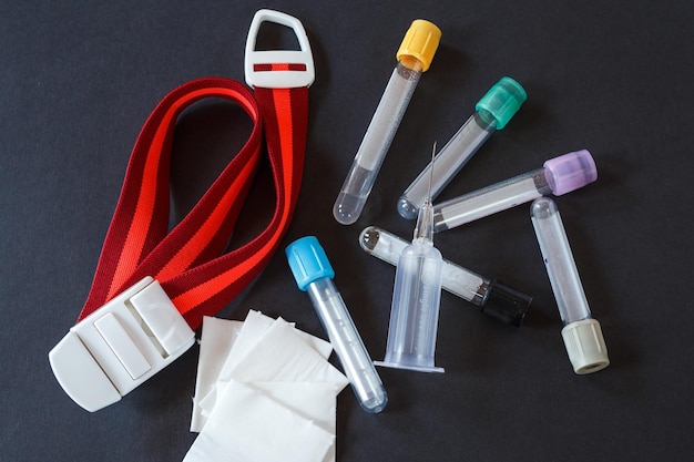 Blood collection sets and syringes in laboratory environment