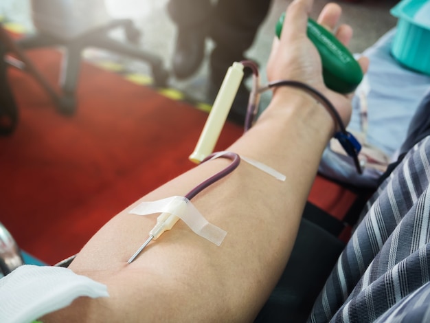 Blood Donor Making Donation In Hospital.