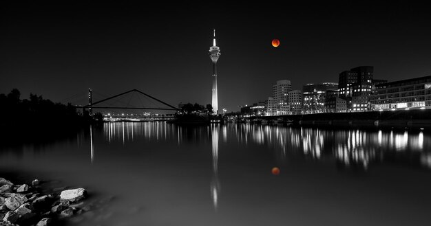 Blood moon over Dusseldorf city