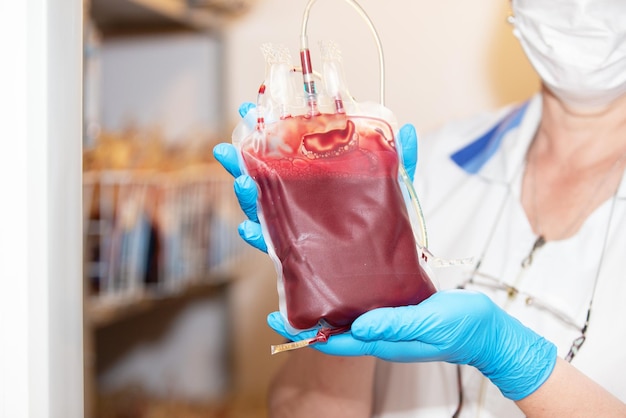 Blood pack for transfusion on white background top view Donation day