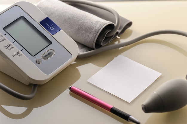 blood pressure monitor with sheet for notes