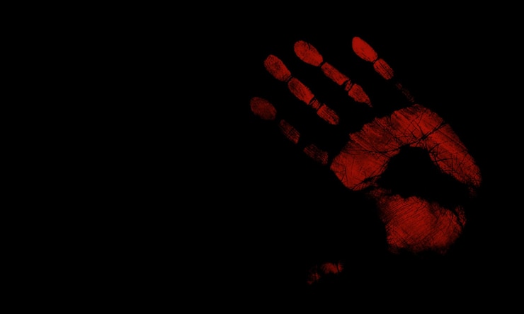 Photo bloody handprint on tblack background