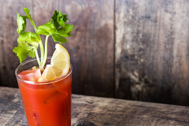 Bloody Mary cocktail in glass on white