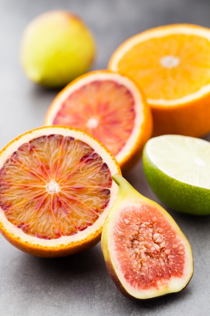 Bloody Sicilian oranges and figs. Shallow depth of field.