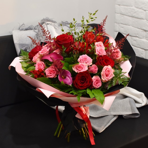 Blooming flower bouquet in a stylish package.