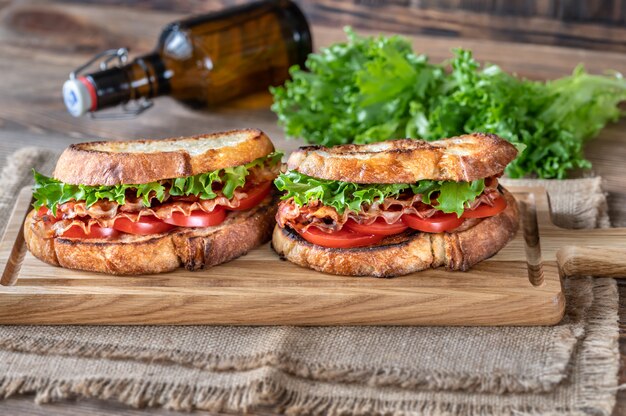 BLT sandwiches on the wooden board