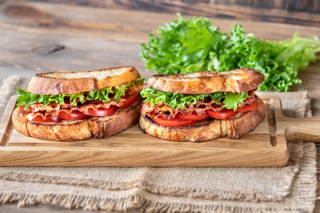 BLT sandwiches on the wooden board