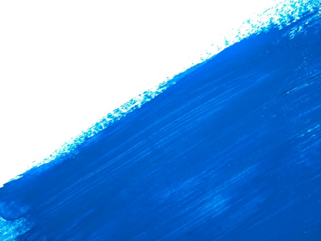 Photo blue acrylic paint stroke isolated on white background abstract art concept