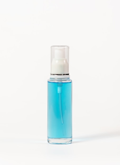 Photo blue alcohol bottle with white indenter