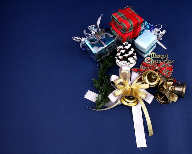 Blue background of decorations and gifts on Christmas day.