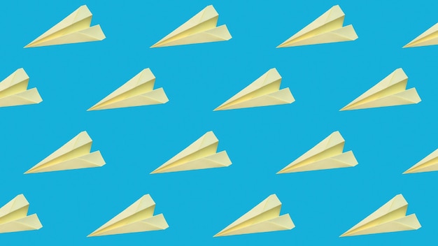 Photo on a blue background a pattern of yellow paper planes origami closeup wallpapers and backgrounds